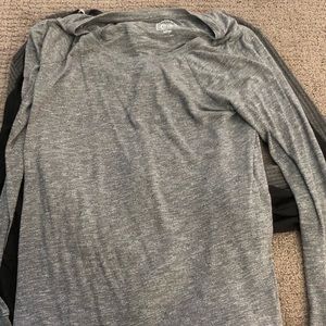 3 - long sleeve tops black and gray. 2 are new with tags the 1 is slightly used.